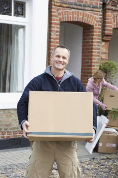 Removal team planning a move in a Hounslow residential street