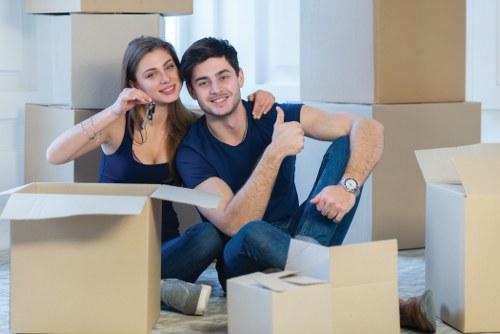 Removal van and moving team planning a house move in Hounslow