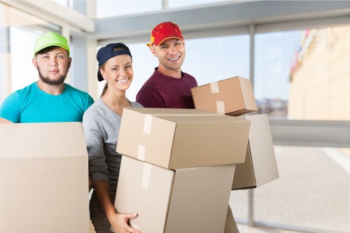 Packed boxes and furniture ready for a home move in Hounslow