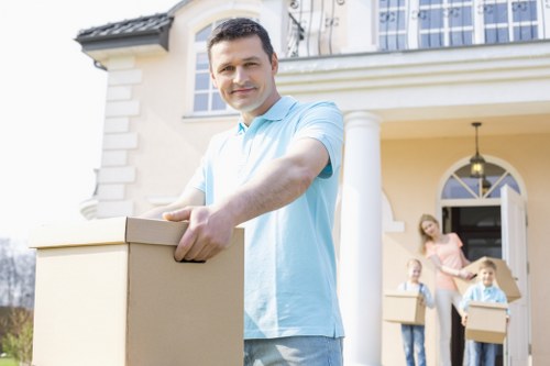 Moving team handling apartment access during a Hounslow relocation