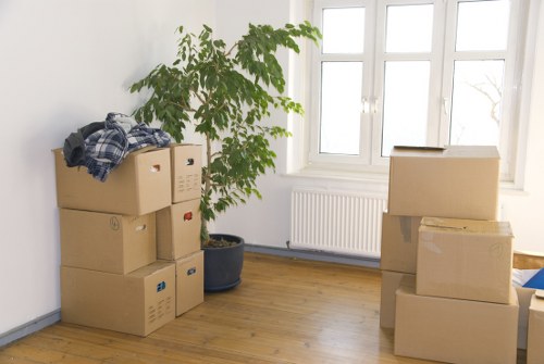 Local removals team loading furniture for transport in west London