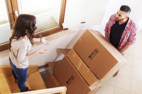 Packed boxes and furniture ready for transport during a local move